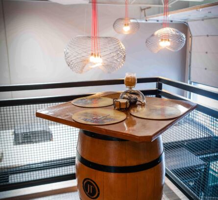 the-vaults-lifestyle-storage-condo-beer-barrel-table-decor